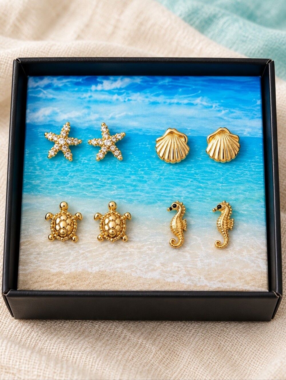 NIB Avon Seaside 4-Pair Gold Tone Stud Earrings Coastal Beach Ocean Set